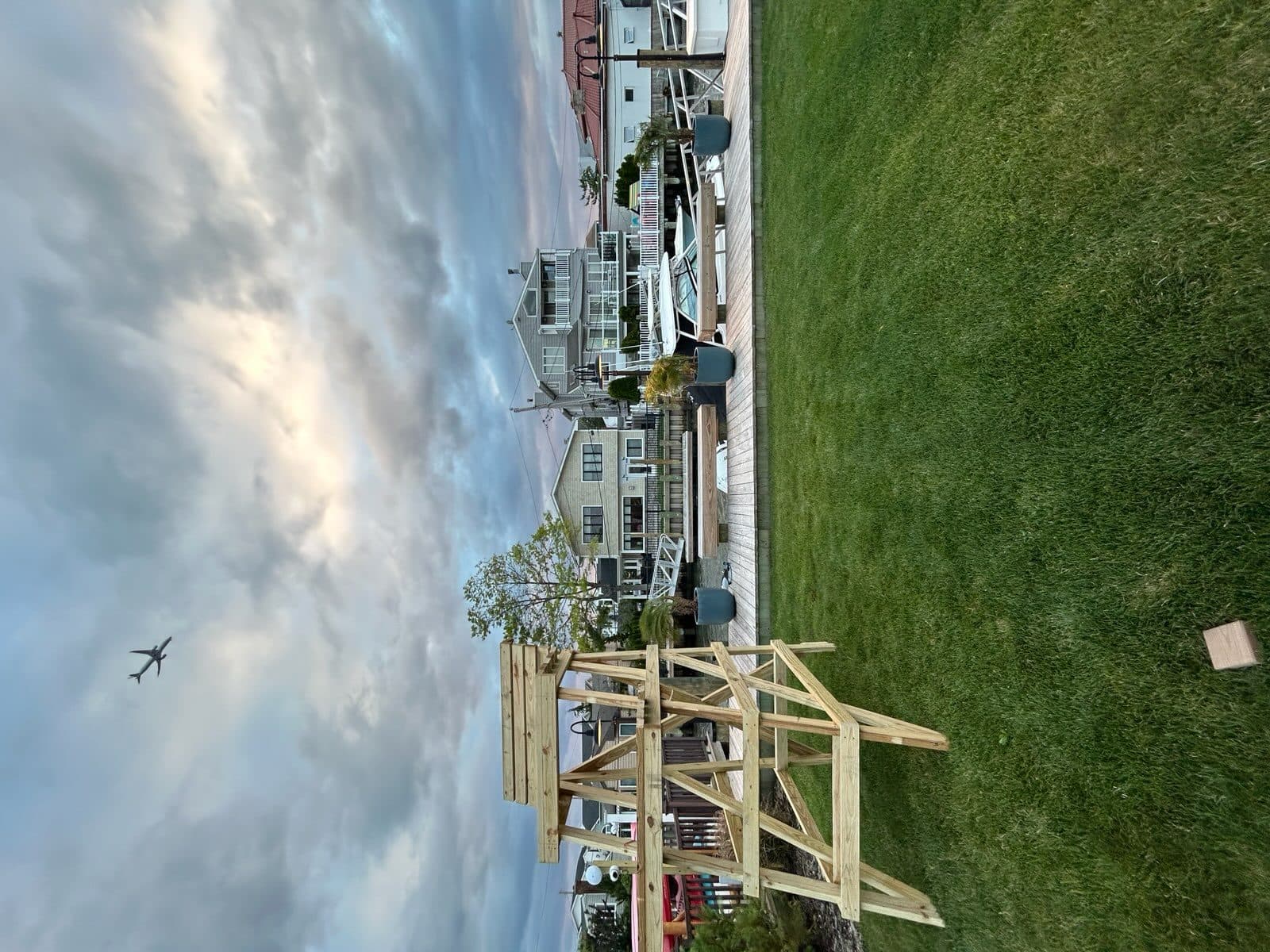 Custom outdoor wooden pergola with clean lines and natural finish