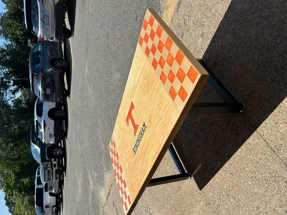 Custom Tennessee Volunteers themed cornhole board with personalized details