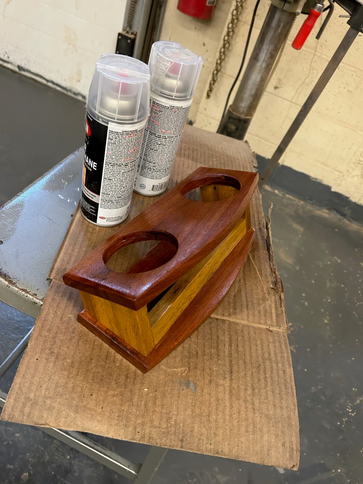 Handcrafted hardwood wine bottle holder with balanced design