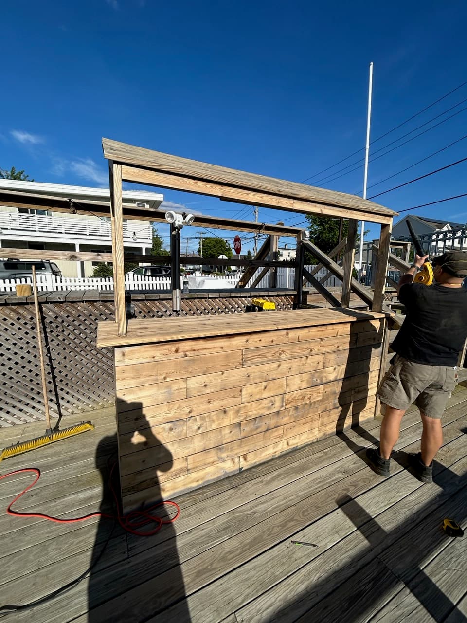 Outdoor dock bar built with reclaimed wood and metal frame