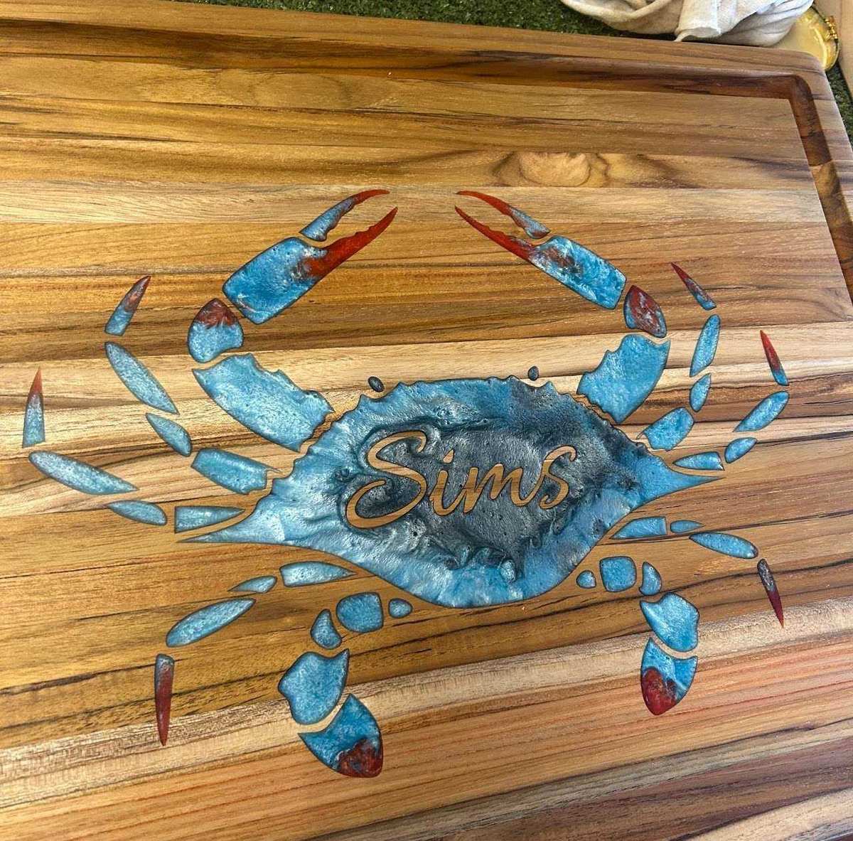 Personalized cutting board with epoxy resin crab inlay design for Sims family